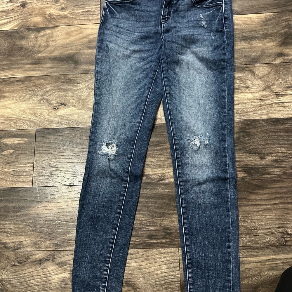Distressed Blue Jeans